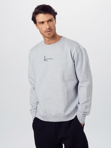 Regular Sweat-shirt Karl Kani en gris : devant