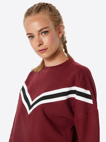 Sweat-shirt Urban Classics en rouge