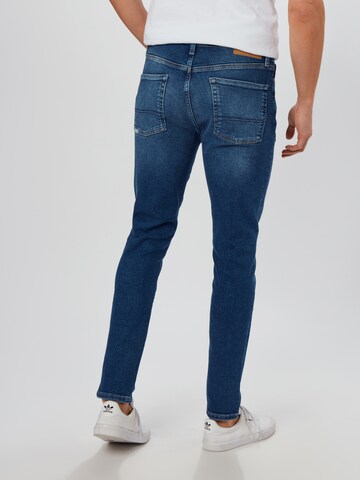 Superdry Skinny Jeans '02 Travis' in Blauw