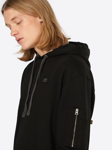 ALPHA INDUSTRIES Collegepaita 'X-Fit' värissä musta