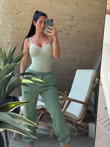 Green Pants And Body Look