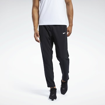 Reebok - Loosefit Calças de desporto 'Workout Ready' em preto: frente