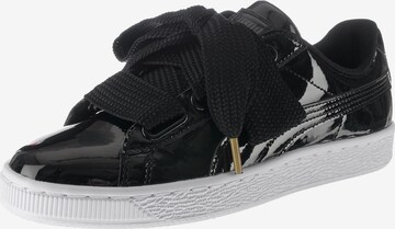 Baskets basses PUMA en noir : devant