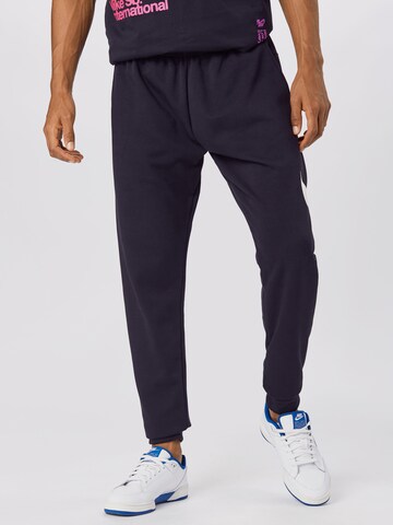 NIKE Tapered Sportsbukser i sort: forside