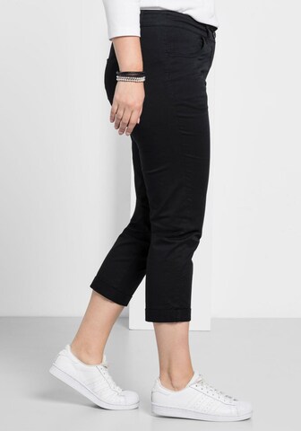 SHEEGO Slimfit Hose in Schwarz