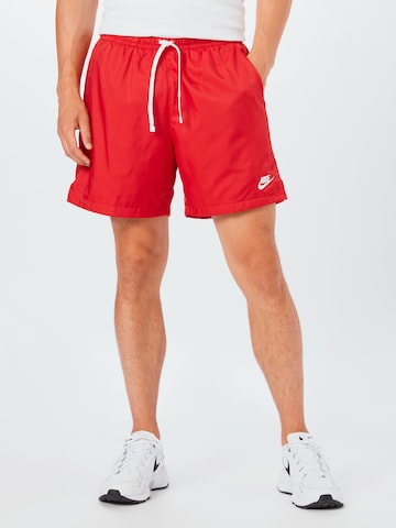 Nike Sportswear - Regular Calças funcionais em vermelho: frente