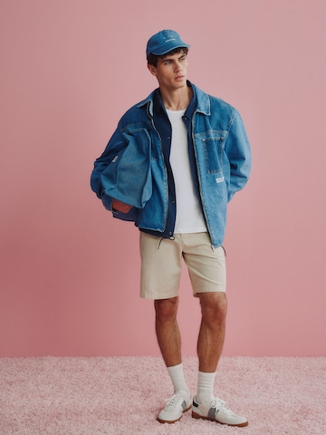 Denim Jacket With Beige Shorts Look