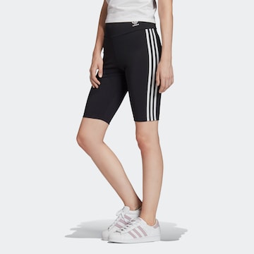 Skinny Leggings ADIDAS ORIGINALS en noir : devant