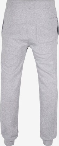 Tapered Pantaloni di Urban Classics in grigio