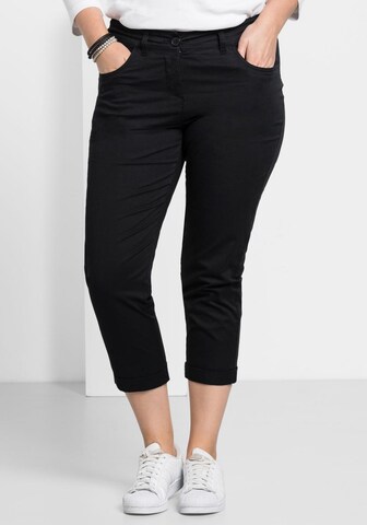 SHEEGO Slim fit Trousers in Black: front