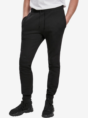 Urban Classics - Tapered Pantalón en negro: frente