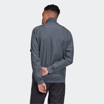 ADIDAS SPORTSWEAR - Casaco de treino em cinzento