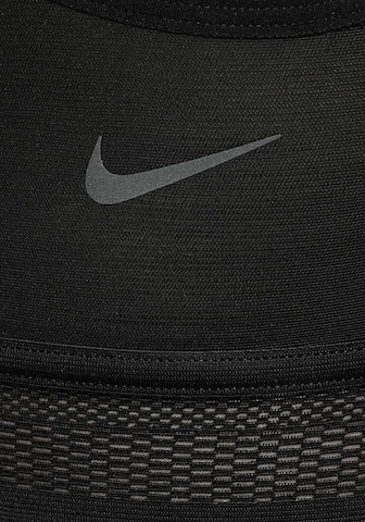 NIKE Regular Sports bra in Black