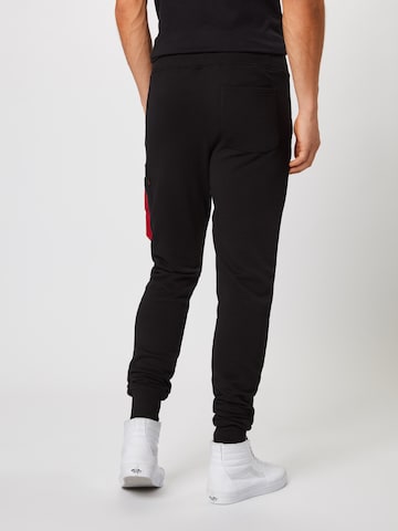 ALPHA INDUSTRIES Tapered Nadrág 'X-Fit' - fekete