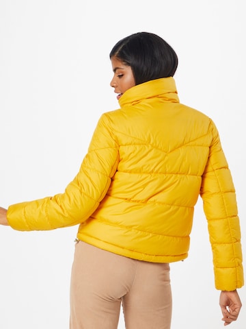 QS Zimní bunda – žlutá: zadní strana
