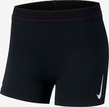 Skinny Pantaloni sport de la NIKE pe negru: față