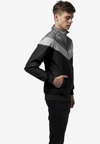 Urban Classics Prehodna jakna 'Arrow ' | črna barva