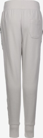 UNDER ARMOUR Loosefit Jogginghose in Grau