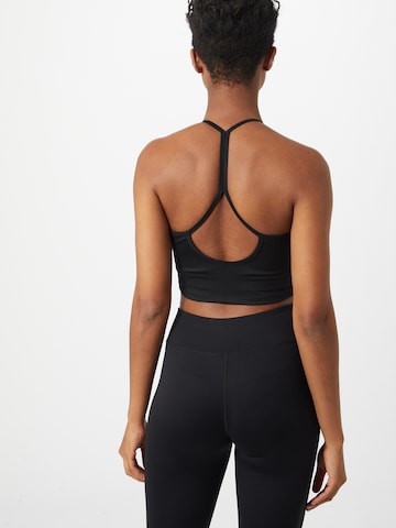 CURARE Yogawear regular Αθλητικό σουτιέν σε μαύρο