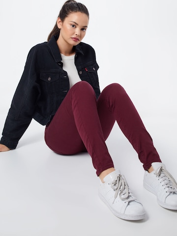 Skinny Jeans 'VMHot Seven' de la VERO MODA pe roșu