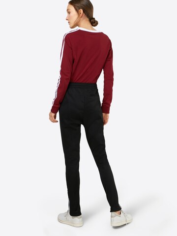 ADIDAS ORIGINALS Skinny Spodnie w kolorze czarny: tył
