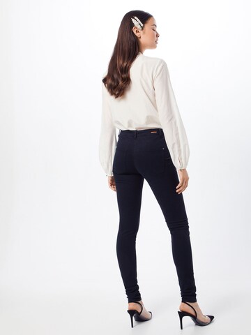 Skinny Jeans de la ESPRIT pe negru: spate