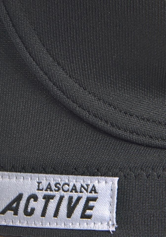 Bustino Reggiseno sportivo di LASCANA in nero