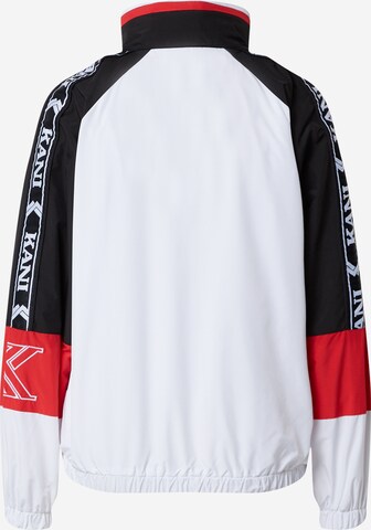 Veste mi-saison 'Windrunner' Karl Kani en blanc