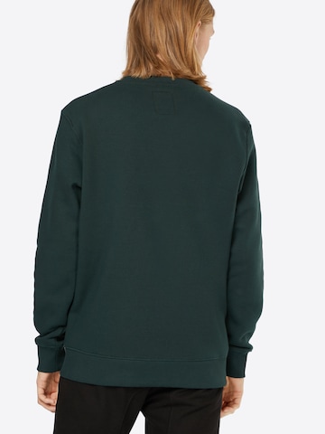 Bluză de molton de la ALPHA INDUSTRIES pe verde: spate