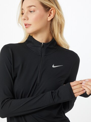 NIKE Funktionsbluse 'ELEMENT' i sort