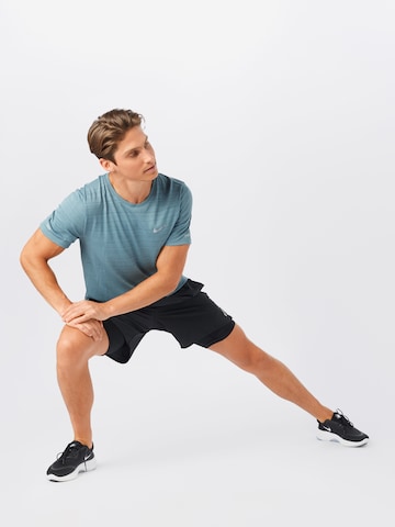 NIKE Performance shirt 'Miler' in Blue