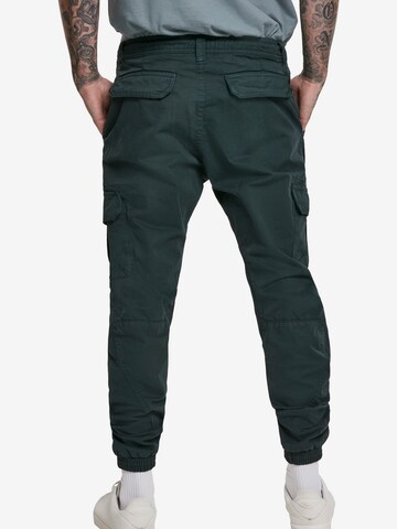 Effilé Pantalon cargo Urban Classics en vert