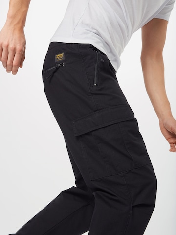 Carhartt WIP Regular Cargohose in Schwarz