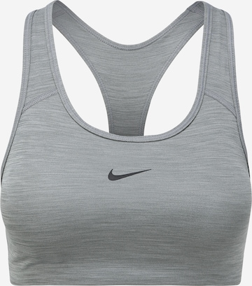 Reggiseno sportivo di NIKE in grigio: frontale