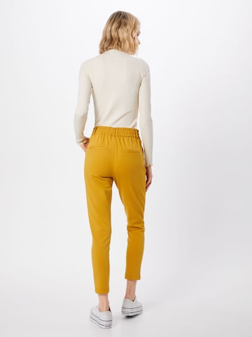 ONLY Slimfit Élére vasalt nadrágok 'Poptrash' - sárga: hátul