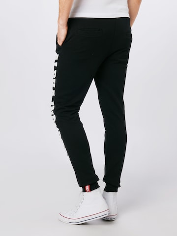 ALPHA INDUSTRIES Tapered Broek in Zwart