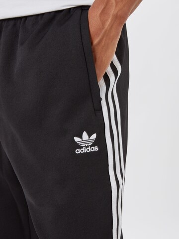 ADIDAS ORIGINALS Tapered Trousers in Black