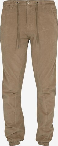 Pantaloni di Urban Classics in beige: frontale