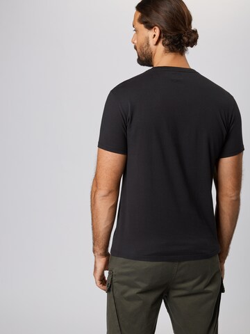LEVI'S ® Koszulka 'Housemark V Neck Tee' w kolorze czarny