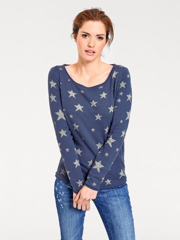 Tricou de la heine pe albastru: față