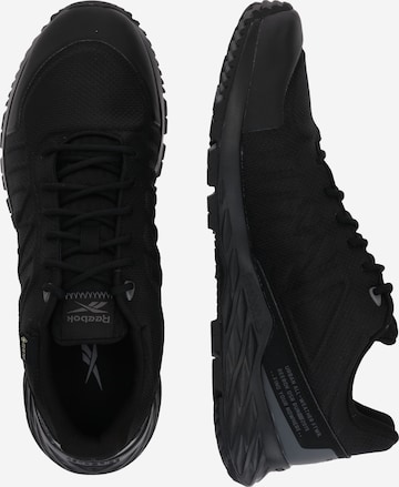 Scarpa sportiva 'ASTRORIDE' di Reebok in nero