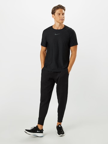 NIKE Regular Fit Funktionsshirt 'Pro' in Schwarz