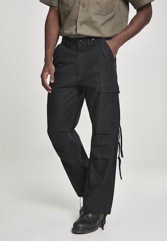 Brandit Loose fit Cargo Pants in Black: front