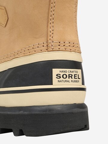 SOREL Talvisaappaat 'Caribou' värissä beige