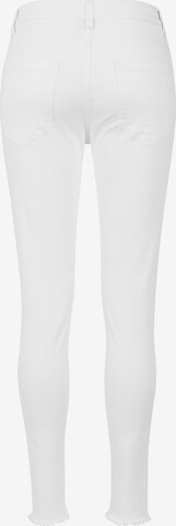 Skinny Jeans di Urban Classics in bianco