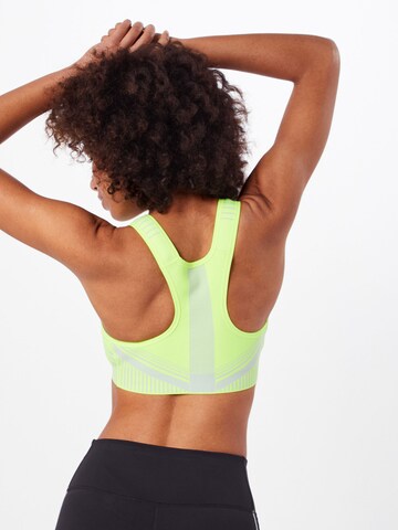 NIKE Regular Sports bra 'FE/NOM Flyknit High Support Sports Bra' in Yellow: back