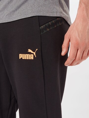 PUMA Regularen Športne hlače | črna barva