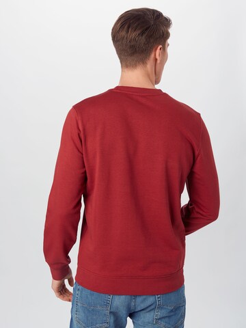 Coupe regular Sweat-shirt Champion Authentic Athletic Apparel en rouge