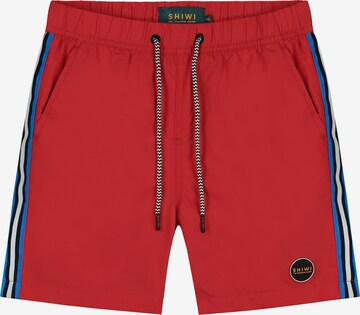 Shiwi Regular Board Shorts 'tom tape' in Red: front