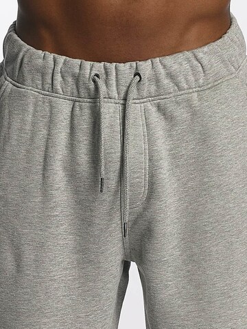 ROCAWEAR Tapered Trousers in Grey